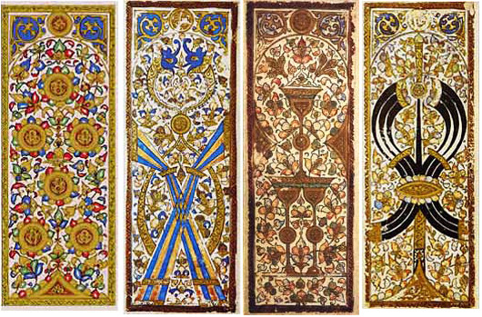 4 cards sit next to each other: an ornate 6 of coins card, 10 of blue and yellow polo sticks, golden 3 of cups, and curvy black 7 of swords. 
