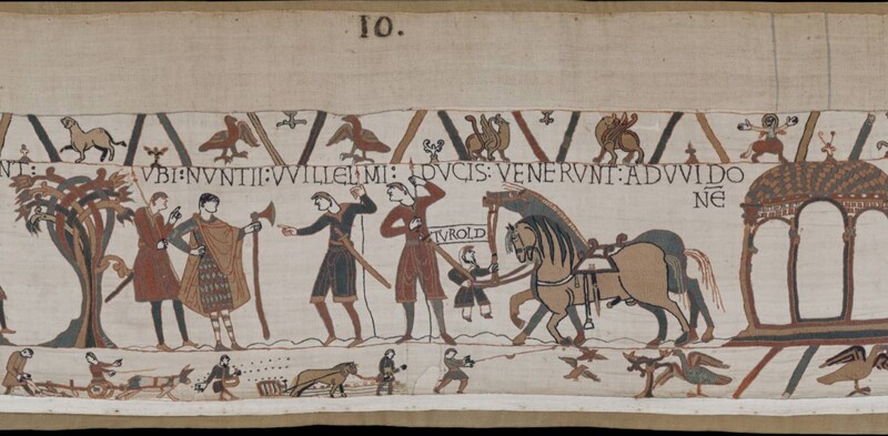 A screenshot of panel 10 of the Bayeux Tapestry. Figures with dane axes converse near horses.