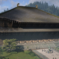 A screenshot taken looking at the Daibutsuden hall in Ubisoft's Assassin's Creed Shadows. The view focuses on the large wooden main hall of the Todai-ji temple complex during the day, showing the hall in a state of disrepair. 
