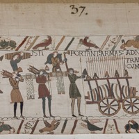 A screenshot of panel 37 of the Bayeux Tapestry. Many figures prepare for war, carrying weapons and armour.