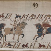 A screenshot of panel 49 of the Bayeux Tapestry. Figures on horseback face off; the central figure wields a club.
