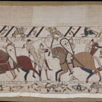 A screenshot of panels 52 and 53 of the Bayeux Tapestry. Figures on and off of horseback clash in battle, wielding swords, spears, axes, and shields. Men and horses both fall in battle.